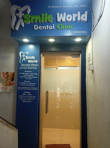 Smile World Dental Clinic entrance with branded signage
